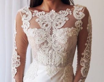 Stunning Boho Style Tight Fitting Wedding Dress Featuring Long Sleeves, Beaded Bodice part and Open Back