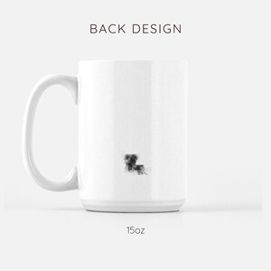 May include: White ceramic mug with a black outline of the state of Louisiana. The mug is 15 ounces.
