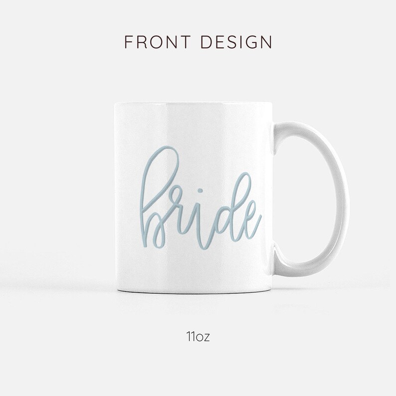 May include: White ceramic mug with a light blue cursive inscription that reads "bride". The mug is 11 ounces.