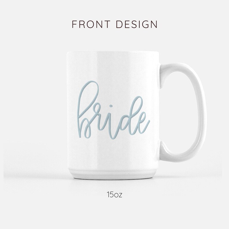 May include: White ceramic mug with a light blue cursive inscription that reads "bride". The mug is 15 ounces.