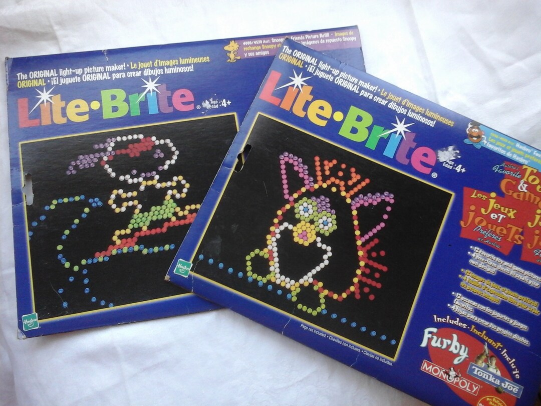 Lot of 40 Vintage 1999 Lite Brite Refill Sheets Furby Monopoly Snoopy Peanuts Tonka Joe Mr ...