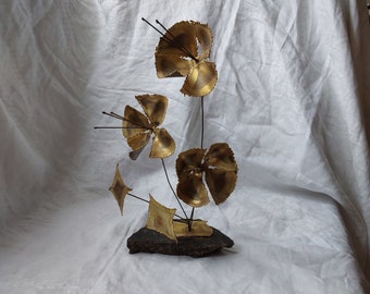 Mid-century brutalist Curtis Jere style metal flower sculpture on granite base