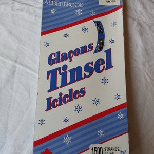 One package unopened silver tinsel Christmas tree icicles 1500 strands made in Canada by Alderbrook