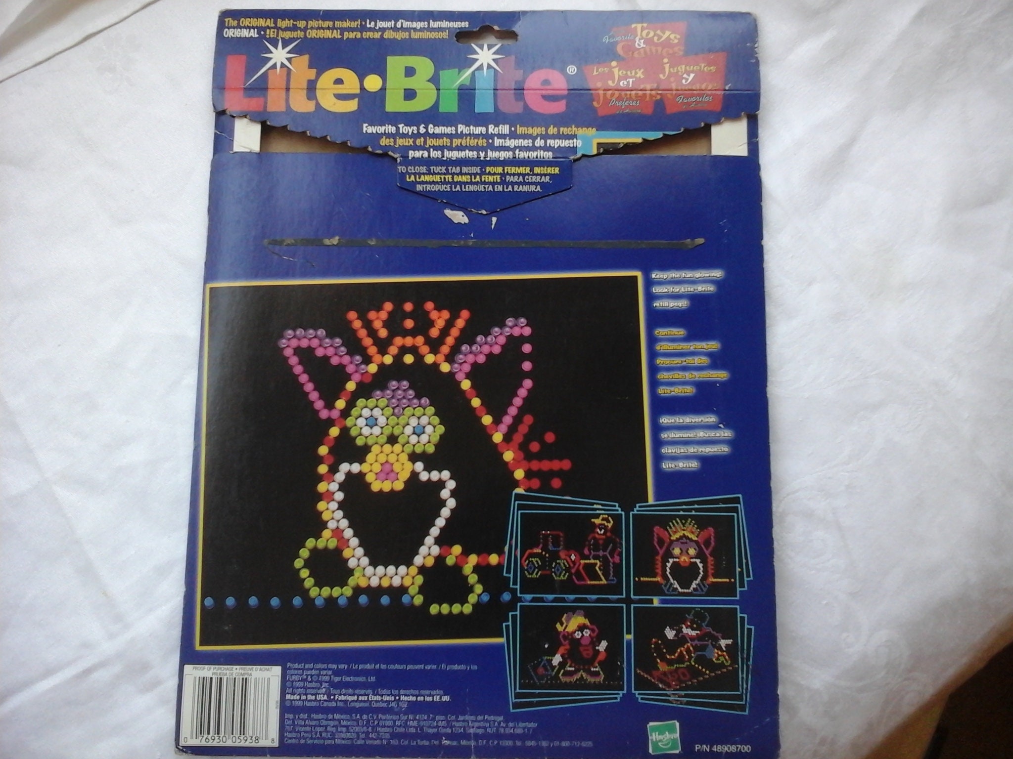 Lot of 40 Vintage 1999 Lite Brite Refill Sheets Furby Monopoly Snoopy Peanuts Tonka Joe Mr ...