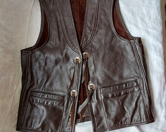 Vintage 1980s western brown leather vest with  conchas size 40 36 inches across chest made in Calgary Alberta