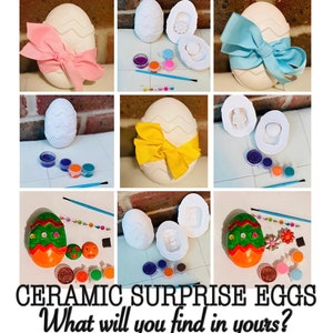 May include: Ceramic Easter eggs with a surprise inside. Each egg is painted white with a zig-zag pattern and comes with a bow in a different colour: pink, yellow, and blue. The eggs are open to reveal a small figurine inside. Each egg comes with a set of paints and a paintbrush.