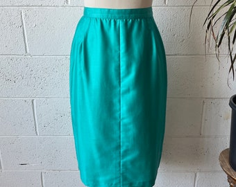 Jaren '80 OGNIBENE ZENDMAN Hoog getailleerde turquoise satijnen knop terug geplooide potlood midi rok 26" taille