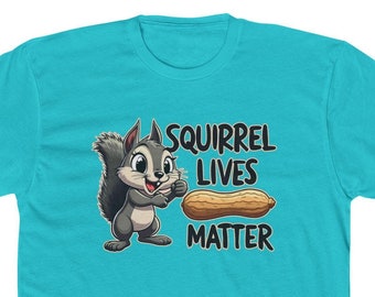 May include: A turquoise blue t-shirt with a cartoon squirrel holding a peanut and the text "Squirrel Lives Matter".