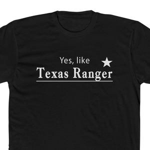 May include: Black t-shirt with white text that reads "Yes, like Texas Ranger" and a white star.