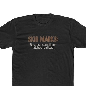 May include: Black t-shirt with the text "SKID MARKS: Because sometimes it itches real bad."