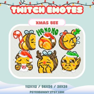 以下が含まれることがあります： クリスマスをテーマにした6つのハチの絵文字のコレクション。黄色と黒のハチは、サンタの帽子やトナカイの角などのお祝いのアクセサリーを身につけています。「TWITCH EMOTES」と「XMAS BEE」の文字が画像の上に表示されています。