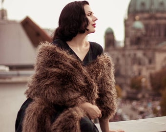 A glamorous faux fur couture stole