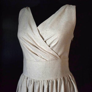 An incredibly beautiful top quality handmade 100 years old buret silk dress, comes with a matching purse. Unique fabric and the dress!