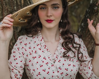Cappello di paglia naturale intrecciato a mano