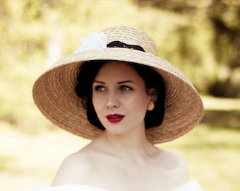 A New Look wide brim Audrey Hepburn straw hat. 100% natural finest straw, hand made to your measure