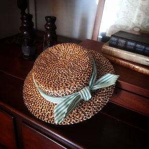 A beautiful melange 100% wheat straw mini canotier. Free shipping worldwide!