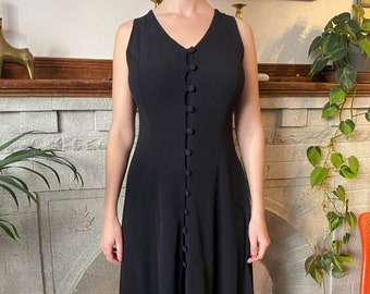 90s black sleeveless midi length button up dress with cross back detail