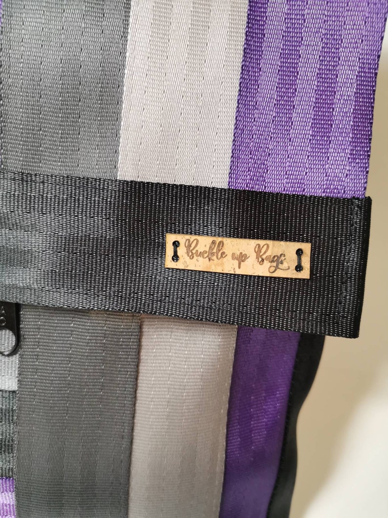 Upcycled seatbelt backpackcrossbody travel bag made from reclaimed seatbelt Recycled ladies bag purple backpack with pockets and zippers