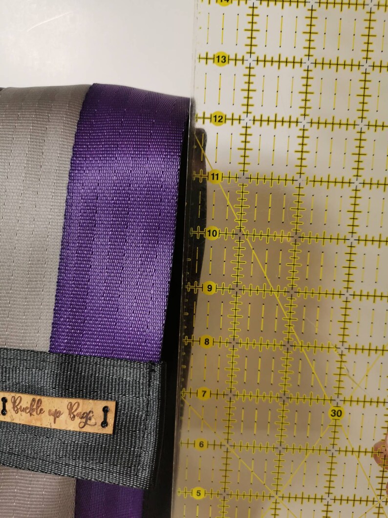 Upcycled seatbelt backpackcrossbody travel bag made from reclaimed seatbelt Recycled ladies bag purple backpack with pockets and zippers