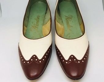 red and white spectator pumps