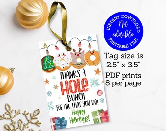 Puede incluir: Una etiqueta de regalo navideña imprimible con una cinta dorada. La etiqueta presenta diseños de rosquillas y el texto "Thanks a Hole Bunch for all that you do! Happy Holidays!". El tamaño de la etiqueta es de 6,35 cm x 8,89 cm.