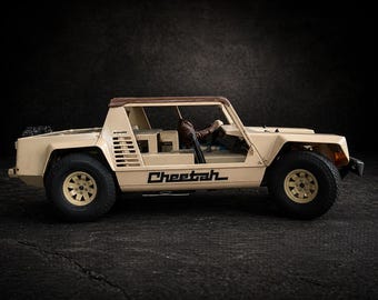 Coche teledirigido Tamiya Cheetah Lamborghini clásico de 1978, escala 1/12, con mando a distancia y manual.