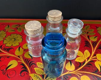 Vintage Apothecary Bottles: Blue & Clear Glass Pharmacy Jars - Set of 4