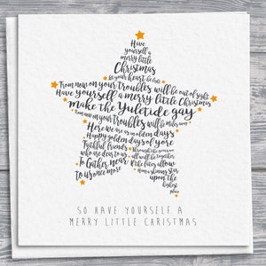 Weihnachtskarte in Form eines Sternes, goldene Stern-Details, frohe kleine Weihnachtsgruß, festliche Feiertagskarte