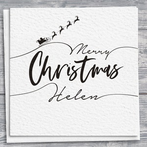 Cartão de Natal personalizado com trenó do Papai Noel e renas, saudação quadrada "Feliz Natal" desenhada à mão