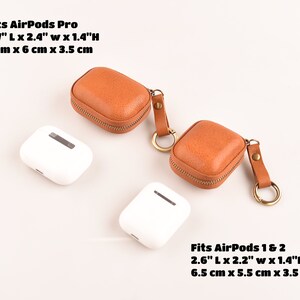 May include: Two brown leather zippered cases with keychains for AirPods Pro and AirPods 1 & 2. The cases are 2.7 inches long by 2.4 inches wide by 1.4 inches high for AirPods Pro and 2.6 inches long by 2.2 inches wide by 1.4 inches high for AirPods 1 & 2.