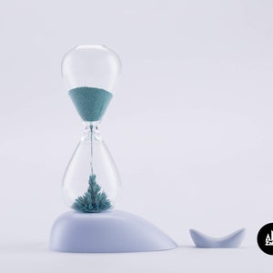 K&ouml;nnte beinhalten: Eine blaue Sanduhr mit einem blauen Sandtimer im Inneren, die auf einer wei&szlig;en Walfigur sitzt. Die Sanduhr steht auf einer wei&szlig;en Oberfl&auml;che. Die Walfigur hat eine kleine Schwanzflosse. Der Text "Zakkr" befindet sich auf einem schwarzen Kreis in der unteren rechten Ecke des Bildes.