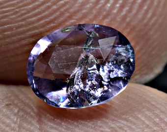 0.7 Carat Faceted Fluorescent Scapolite Cut gemstone From Badakhshan Afghanistan