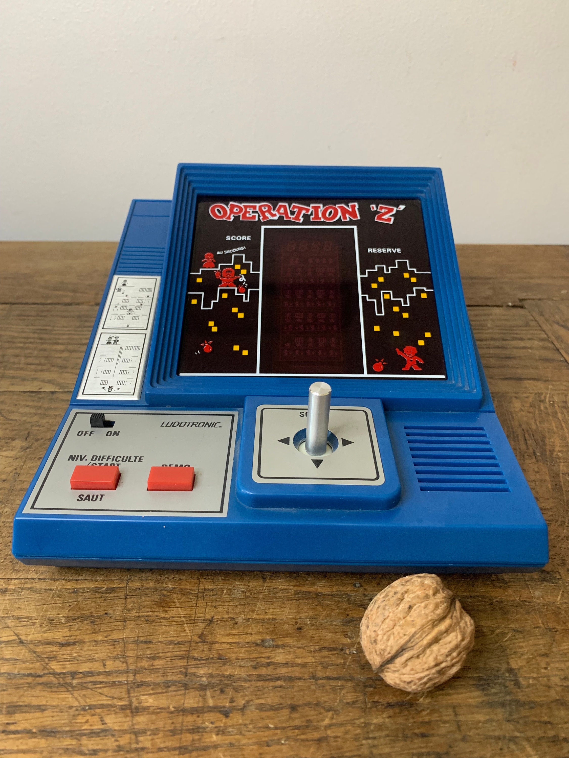 HC-8050 Bleu - Machine de jeu électronique classique pour enfants, console de jeu en brique