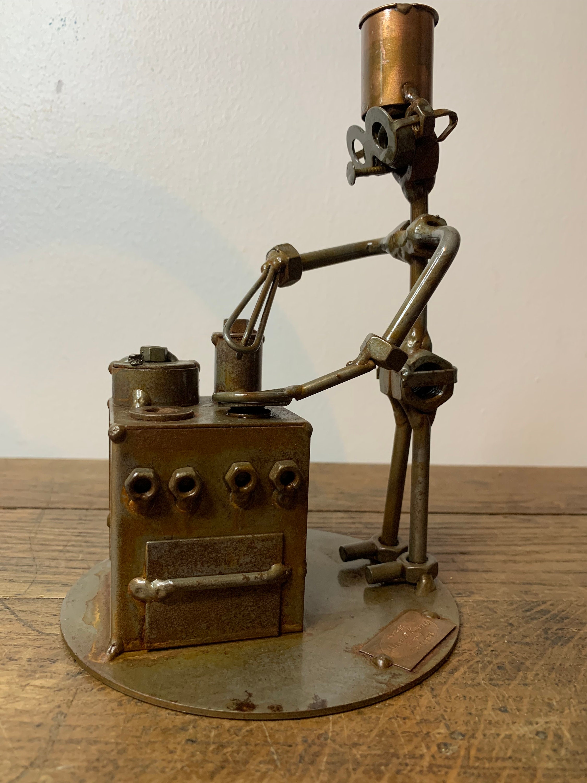 Vintage cook metal sculpture