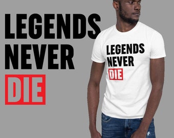 May include: White t-shirt with black text that reads "Legends Never Die" with the word "Die" in red.