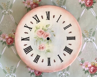 Horloge vintage rose en céramique avec cadran rose