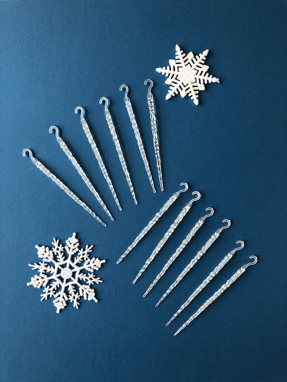 Vintage plastic snowflakes and icicles. 11