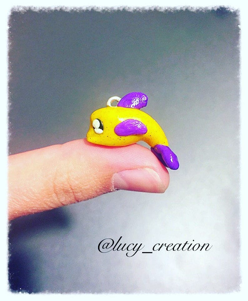 Polymer clay glittered yellow dolphin image 1