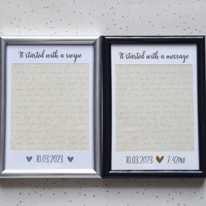 May include: Two silver and black picture frames with white mounts. The frames are side-by-side. The top of each frame has text that reads "It started with a swipe" and "It started with a message". The bottom of each frame has a date and time. The silver frame has the date "10.03.2023" and two hearts. The black frame has the date "10.03.2023" and a heart with the time "7:42PM".