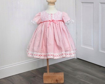 vintage length lace trim pink dress, angel flutter sleeves, matching bloomers. Easter spring