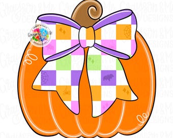 May include: Orange pumpkin with a brown stem and a large bow. The bow features a checkered pattern in purple, orange, and green, with Halloween-themed icons. The pumpkin has white outlines and decorative swirls.