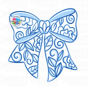 May include: A light blue bow design with floral and leaf patterns. The bow features a detailed outline and is filled with intricate designs. The image includes the text "Grayson & Me Designs" in the upper left corner.