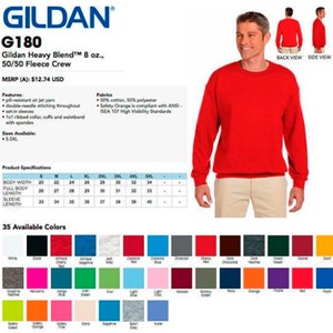Puede incluir: Una sudadera roja Gildan Heavy Blend 8 oz. 50/50 Fleece Crew con el texto "Gildan G180" y "MSRP (A): $ 12,74 USD" en la esquina superior izquierda. La sudadera se muestra en un modelo que la lleva puesta. Una tabla de tallas y una tabla de colores se muestran debajo del modelo. La tabla de colores muestra 35 colores diferentes.