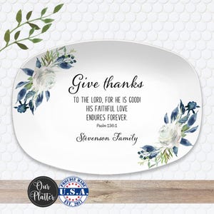May include: White oval platter with floral watercolor design and text that reads "Give thanks". The text includes a Bible verse and the family name. The platter has a floral design in the corners.