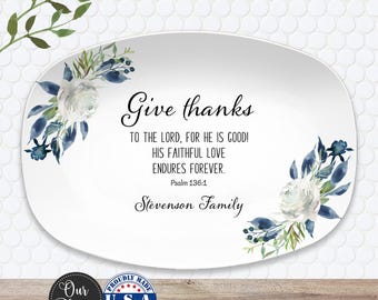 May include: White oval platter with floral watercolor design and text that reads "Give thanks". The text includes a Bible verse and the family name. The platter has a floral design in the corners.