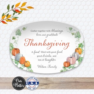 May include: Oval Thanksgiving platter with a decorative border of pumpkins and leaves. The platter features the words "Thanksgiving" and "Gather together with blessings, love, and gratitude." The platter is made in the U.S.A.