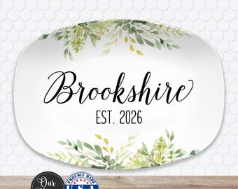 May include: White oval platter with the name "Brookshire" in elegant black script, and "EST. 2026" below. The platter is decorated with green and yellow watercolor foliage. The platter is proudly made in the U.S.A.