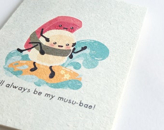 May include: A cute cartoon illustration of a sushi roll riding a surfboard with a piece of salmon on top. The text "I'll always be my musu-bae!" is written below the image.