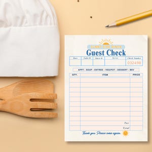 May include: A "Sunny Side Diner" guest check with a blue border and the text "Guest Check". The check includes sections for date, table number, and itemized orders. A wooden spatula and chef's hat are in the background.