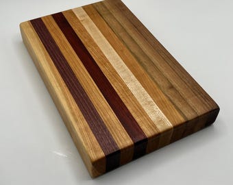 Tabla de cortar de madera dura: nogal, padauk, palo morado, cerezo y arce.